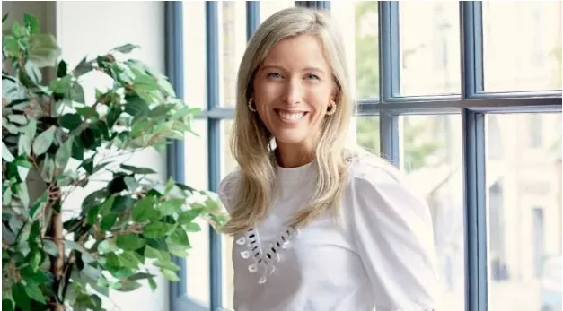 Samantha Woodham, co-founder of The Divorce Surgery, photographed by a window for the Conflict to Connection podcast feature on rethinking divorce.
