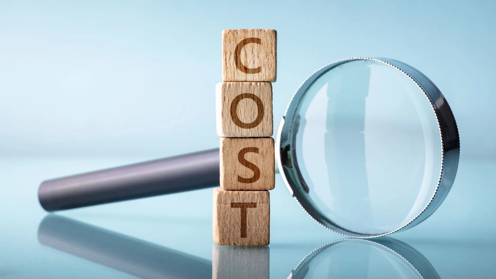 Magnifying glass highlighting the cost of amicable divorce
