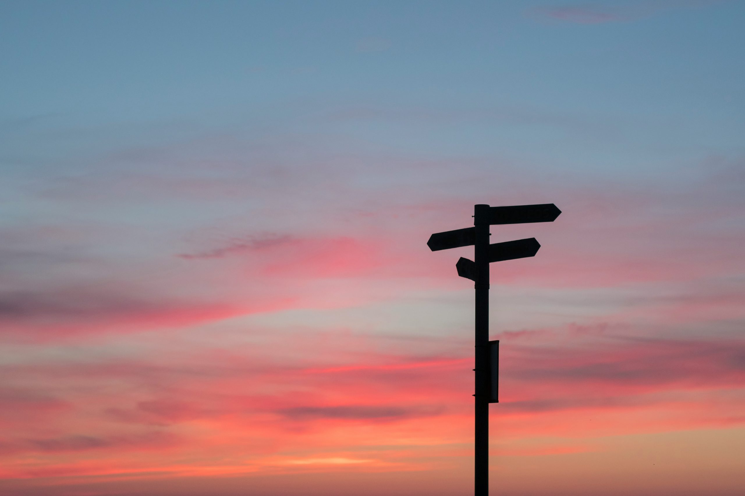 Signpost showing different routes as an alternative to divorce mediation
